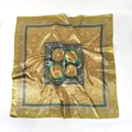 Detailed top view of 90cm square satin scarf featuring golden Baroque pattern on white background - Green