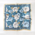 Satin floral square scarf with elegant rose patterns and gold borders on a blue base - Blue