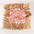 Detail of 90cm satin silk scarf showing floral print with golden-brown borders - Pink Floral