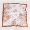 Detailed close-up of white satin square scarf featuring golden floral chrysanthemum patterns - 90*90cm / Khaki