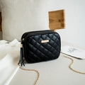 Quilted black crossbody bag with gold chain strap and elegant tassel detail - Black