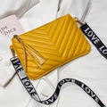 Bright yellow V-quilted crossbody bag with fringe tassel and LOVE letter strap - Yellow