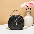 Mini round quilted cross body bag in black with golden cat charm and chain strap - Black