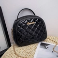 Women's black quilted crossbody bag with gold chain strap and metallic logo detail - Black