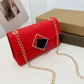 Red quilted small crossbody bag with gold chain strap and black geometric square clasp - Red