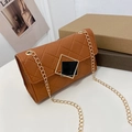 Classic brown quilted chain bag with elegant diamond-shaped clasp and gold hardware - Brown