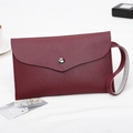 Chic burgundy Napa grain envelope clutch bag with silver snap and wristlet strap - Burgundy