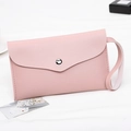 Pink nappa texture envelope clutch bag with silver snap button and wrist strap - Pink