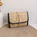 Gewebte Stroh-Umhängetasche in Beige mit schwarzen Akzenten und Goldquaste - Quasten-Stil / Schwarz