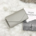 Minimalist grey envelope clutch wallet with litchi grain and pom-pom detail - Gray