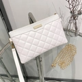 White quilted crossbody bag with golden hardware and dual chain shoulder straps - White