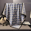Detailed view of blue silk satin scarf featuring vintage carriage patterns and silk texture - 90x90cm / Blue Carriage Pattern (SJ2611-7)