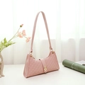 Pink underarm bag with circular embossed leather and golden rotary lock detail - Pink