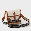 White quilted crossbody bag with brown trim and colorful LOVE letter fabric strap - White