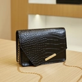 Detail of black crocodile embossed leather crossbody bag with elegant gold chain strap - 19*5.5*13 / Black