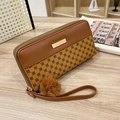 Brown long zipper wallet with floral print, gold trim, and matching fur pompom keychain - Brown
