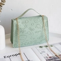 Mint green embossed crossbody bag with chain strap and cartoon pattern design - Light Green