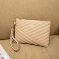 Elegant beige quilted clutch bag with V-shaped stitching and golden metal hardware - Khaki