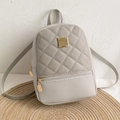 Gray quilted mini backpack in PU leather with elegant golden metal accent and sleek straps - Light Gray