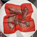 Macro detail of red floral silk scarf with golden metallic stripes in a swirl fold - 80*80cm / Red