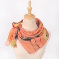 Orange cotton linen scarf with ginkgo leaf print displayed on a mannequin - 90*90cm / Off White