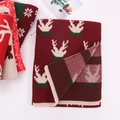 Close-up of festive red and green knitted scarf with reindeer and snowflake patterns - Wine Red Reindeer