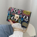 Chic multi-color snakeskin crossbody bag with golden chain and square twist lock - Blue Snake Pattern