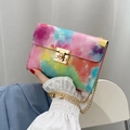 Fashionable colorful tie-dye shoulder bag with golden chain strap and glossy finish - Colorful
