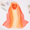 Detail of soft georgette silk scarf showing gradient orange to yellow and wash label - Orange Beige Gradient (Style 10)