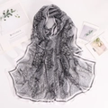 Detail of lightweight black and white paisley chiffon scarf with floral pattern border - Grey Paisley