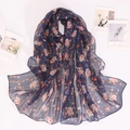 Detailed view of lightweight navy georgette scarf with vibrant small floral print - Navy Blue