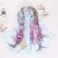 Detail of light blue summer scarf showing purple floral and bird print on georgette fabric - 160x50cm / Light Blue