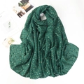 Detail of dark green lightweight cotton linen hijab scarf with golden leaf patterns - Dark Green (15)