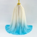 Detail of soft gradient scarf with fringe edges hanging on a display stand - Sky Blue Ombre (#10)