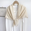 Elegant cream solid square silk scarf on a wooden hanger with a minimalist white background - Off White