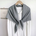 Elegant grey square silk scarf styled with a knot on a white shirt for women - Gray
