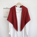 Deep red solid color lightweight scarf draped on a white shirt and wooden hanger - Burgundy