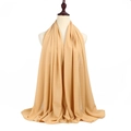 Elegant apricot 75D pearl chiffon long scarf with fine rolled edges on a mannequin - Apricot