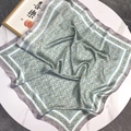 Elegant blue silk square scarf featuring vintage gold chain prints on a marble background - Light Green