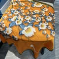 Elegant orange silk square scarf featuring blue floral prints and olive green border - Orange Camellia