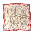 Detail of satin square scarf featuring golden horsebit print and elegant red border design - 90x90cm / Red Border Equestrian Style