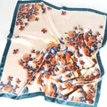Detailed texture of satin square scarf with orange floral print and dark green borders - 90*90cm / Teal