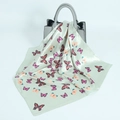 Light green butterfly print satin scarf tied elegantly to a grey designer handbag - Bean Green Butterfly Pattern / 60cmx60cm / Bean Green