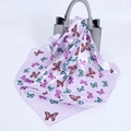 Detailed view of lavender satin butterfly print scarf draped over a grey textured handbag - Light Purple Butterfly Pattern / 60cmx60cm / Light Purple