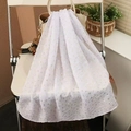 Elegant white floral cotton linen hijab scarf draped over a stylish white handbag - White(12)