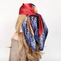 Navy and burgundy paisley satin square scarf displayed on mannequin neck - Spliced Navy Blue