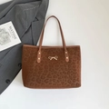 Bruine shopper met luipaardprint, gouden strikdetail en lederen handvatten - Bruin