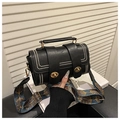 Detail of black Boston bag with double twist locks and ethnic print shoulder strap - Black