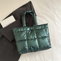 Dark green glossy quilted tote bag with metallic finish and top handles for winter - Green