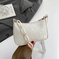 Minimalist beige underarm bag with unique textured fabric and matte chain strap detail - White